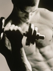 close-up-of-a-young-man-working-out-with-a-dumbbell